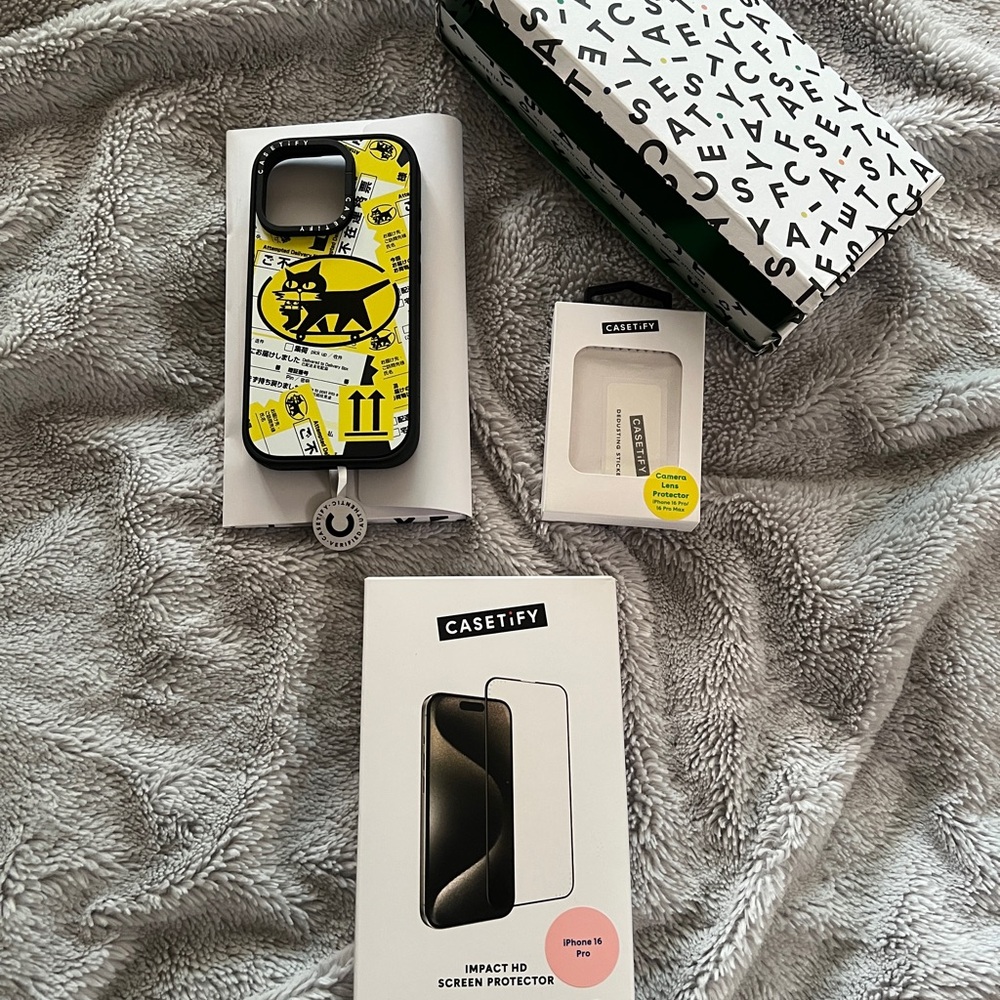 Casetify Black and Yellow Yamato Cat Graphic iPhone 16 Pro Case